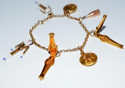 1920s Gold and Enamel Charm Bracelet
