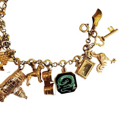 1930s 14K Charm Bracelet with 19 14K Charms