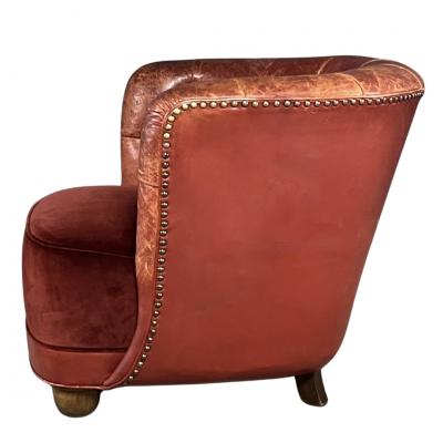 1930s Danish pair of exceptional leather tufted club chairs