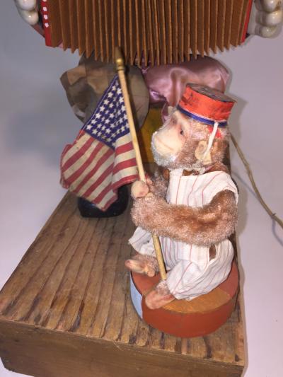 1940s HAND MADE CLOWN PLAYING ACCORDIAN AND MONKEY WITH FLAG AUTOMATON