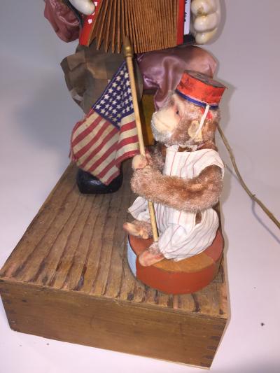 1940s HAND MADE CLOWN PLAYING ACCORDIAN AND MONKEY WITH FLAG AUTOMATON