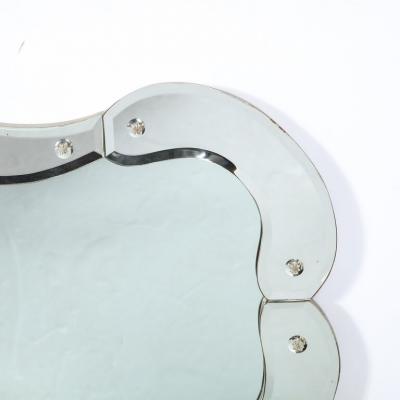 1940s Hollywood Sculptural Beveled Wall Mirror with Stylized Shield Cartouche