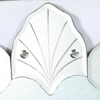1940s Hollywood Sculptural Beveled Wall Mirror with Stylized Shield Cartouche