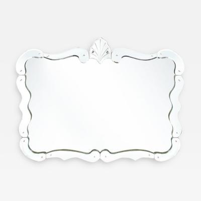 1940s Hollywood Sculptural Beveled Wall Mirror with Stylized Shield Cartouche