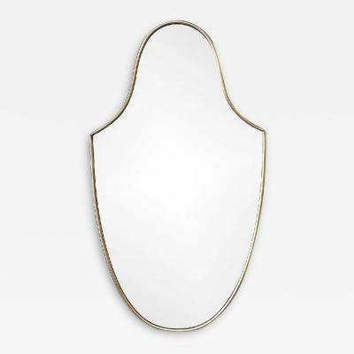 1950S ELONGATED SHIELD MIRROR IN AGED BRASS IN THE STYLE OF GIO PONTI