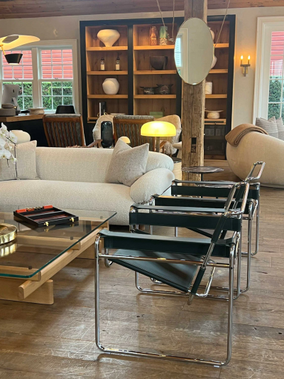 1950S OVAL MIRROR IN AGED BRASS IN THE STYLE OF GIO PONTI