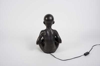 1950s Ceramic lamp showing a little African playing Tom tom signed A Carli