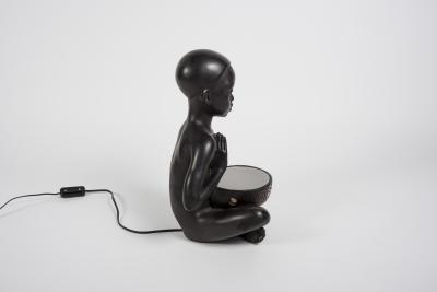 1950s Ceramic lamp showing a little African playing Tom tom signed A Carli