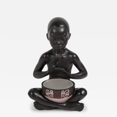 1950s Ceramic lamp showing a little African playing Tom tom signed A Carli