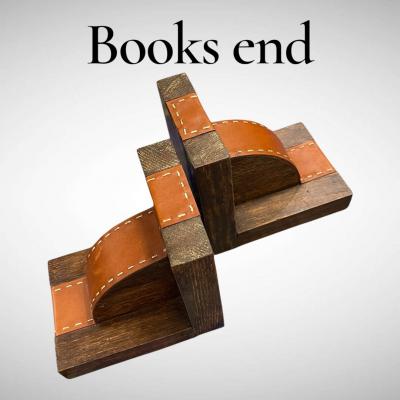1950s Stitched leather books end by Jacques Adnet