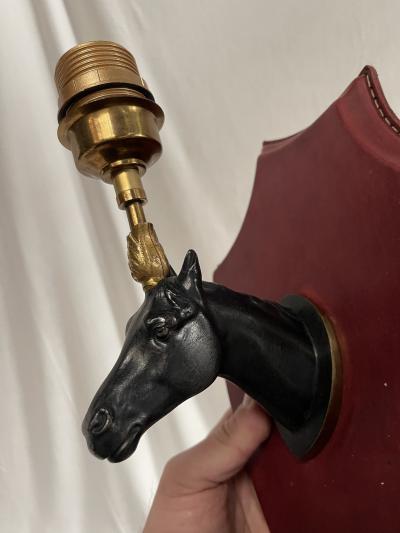 1950s Stitched leather sconces by Jacques Adnet