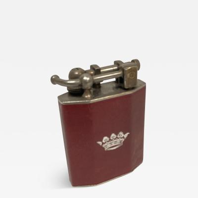 1950s vintage table lighter in leather with a crown emblem
