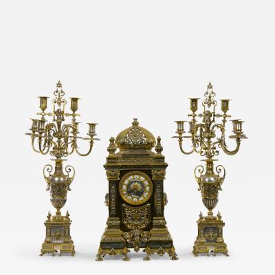 19th Century French Gilt Bronze Silvered Three Piece Clock Garniture