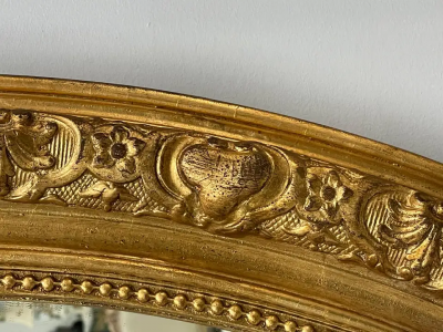 19th Century Palatial Giltwood Wall or Console Mirror Adorning Three Cherubs