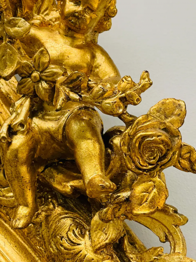 19th Century Palatial Giltwood Wall or Console Mirror Adorning Three Cherubs