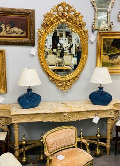19th Century Palatial Giltwood Wall or Console Mirror Adorning Three Cherubs