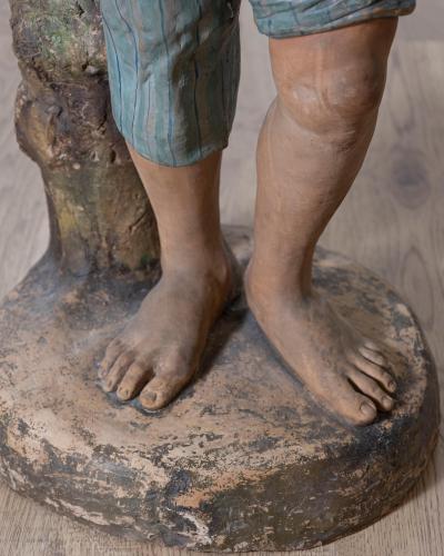 19th Century Polychrome Painted Metal Figure of a Boy with Basket