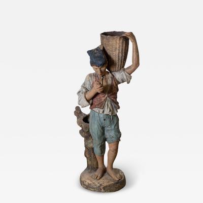 19th Century Polychrome Painted Metal Figure of a Boy with Basket