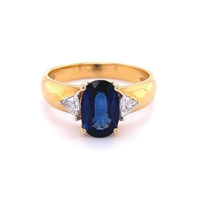 2 32 Carat Oval Cut Blue Sapphire with Trillion Cut Diamond Side stones