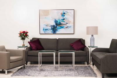 2 Contemporary Tufted Leather Arm Chairs