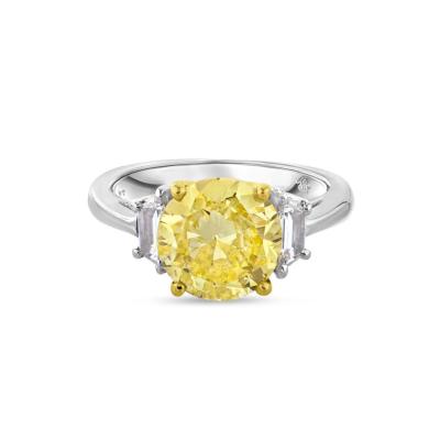 2 carat Fancy Intense Yellow Round Cut And Trapezoid Cuts Three Stone Diamond