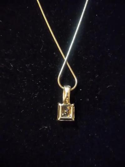 20 Sterling Silver Necklace with a 7 carat Princess cut CZ Pendant