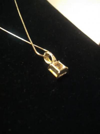 20 Sterling Silver Necklace with a 7 carat Princess cut CZ Pendant