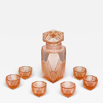 20th Century Art Deco Glass Decanter Set Of Seven Coral Colored AT ca 1920