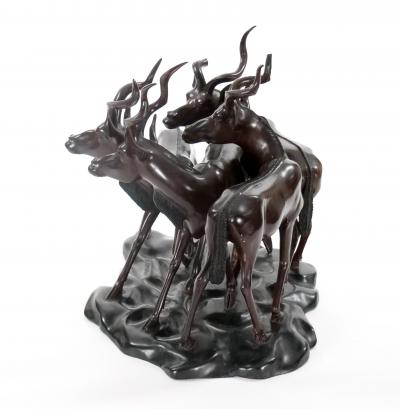 20th Century Hand Painted Wood Decorative Sculpture Pack of Gazelles