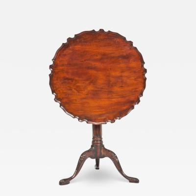 2630 George III mahogany pie crust tilt top table 