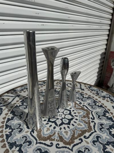 4 Various Size and shaped Nambe Polished Aluminum Candleholders