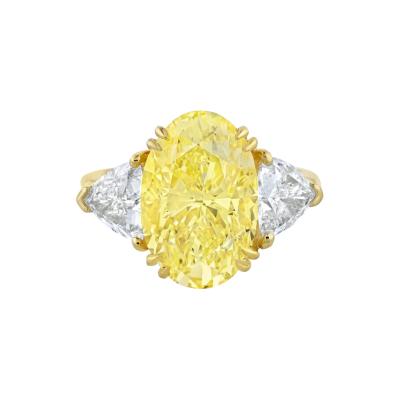 6 95 CARAT OVAL CUT FANCY INTENSE YELLOW THREE STONE DIAMOND ENGAGEMENT RING