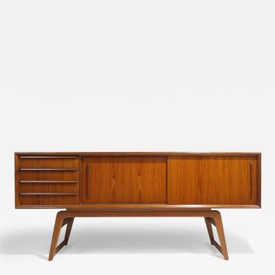 71 Danish Teak Credenza With Sliding Doors on Flared Legs