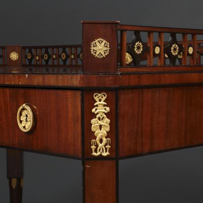 8035 AN EXCEPTIONAL MAHOGANY AND EBONY INLAID AND GILT BRONZE MOUNTED