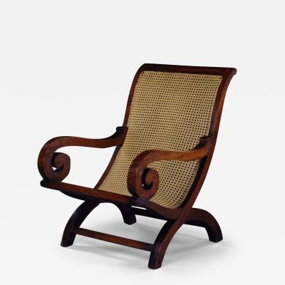9353 A LARGE PAIR OF POSSIBLY GONCALO ALVES X FORM ARMCHAIRS