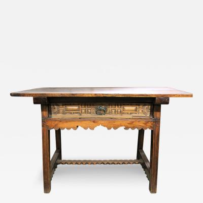 A 17th Century Spanish Walnut and Oak Trestle Table