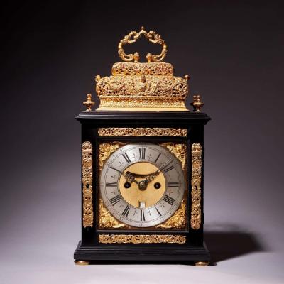 A 17th Century William and Mary eight day double basket table clock by Asselin