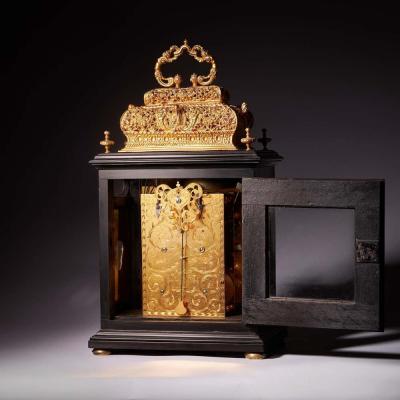 A 17th Century William and Mary eight day double basket table clock by Asselin