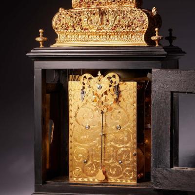 A 17th Century William and Mary eight day double basket table clock by Asselin