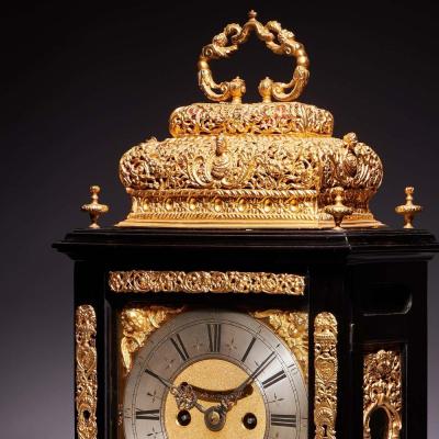 A 17th Century William and Mary eight day double basket table clock by Asselin
