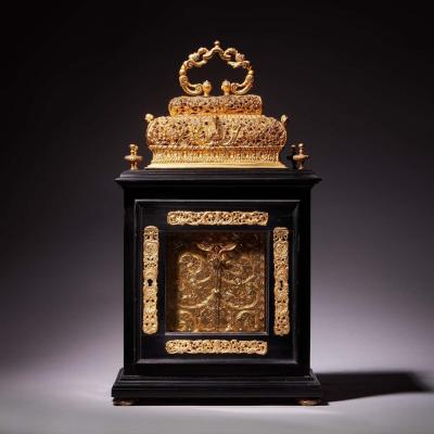 A 17th Century William and Mary eight day double basket table clock by Asselin