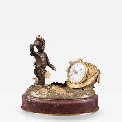 A 19TH CENTURY FRENCH GILT BRONZE ROUGE MARBLE DESK CLOCK INKWELL