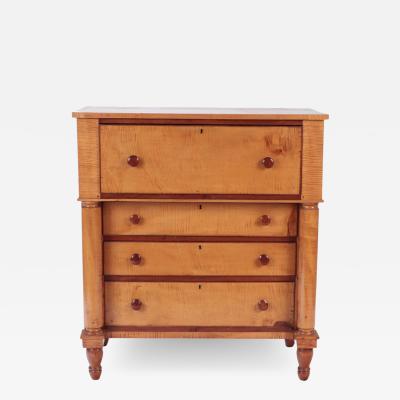 A 19th C tiger maple dresser with full round columns 