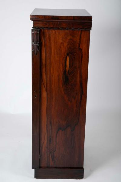 A 19th Century Brazilian Rosewood Six Drawer Wellington High Cabinet