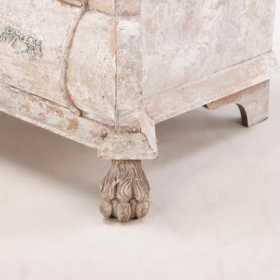 A 19th Century Dutch bombay three drawer commode in bleached finish