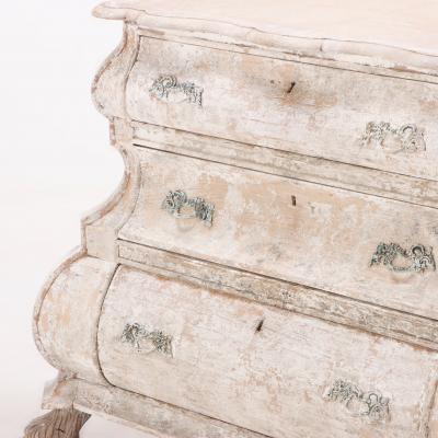 A 19th Century Dutch bombay three drawer commode in bleached finish
