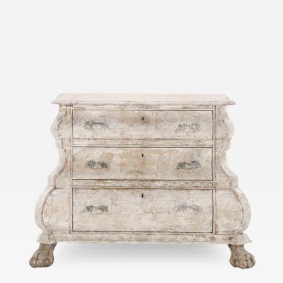 A 19th Century Dutch bombay three drawer commode in bleached finish 