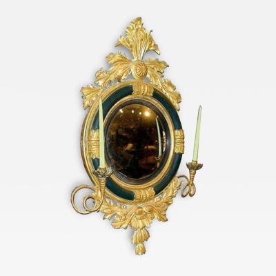 A 19th Century English Regency Carved Ebonized and Parcel Gilt Convex Mirror