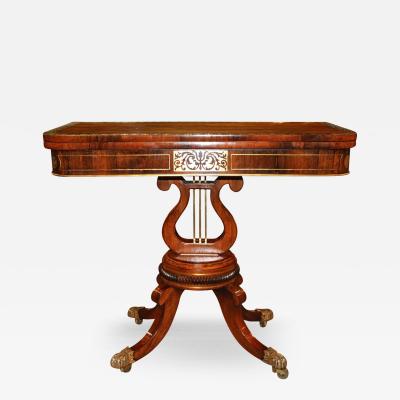 A 19th Century English Regency Rosewood Folding Games Table