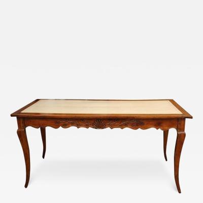 A 19th Century French Cherry Wood Writing Desk in the Louis XV Manner